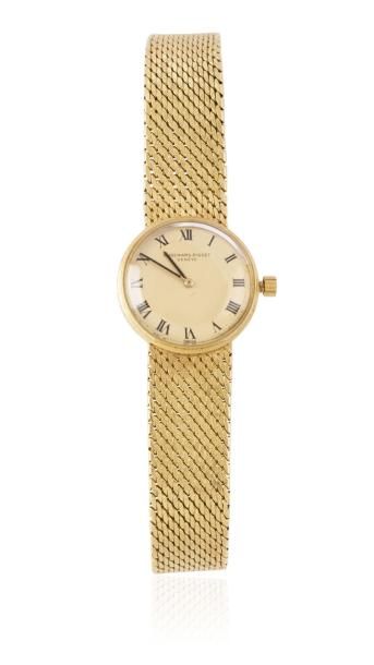 AUDEMARS PIGUET N° 49656 vers 1960 Montre bracelet de dame ronde en or. (couronne...