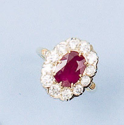 null Bague en or jaune et or gris ornée d'un rubis ovale pesant 3,60 cts environ...