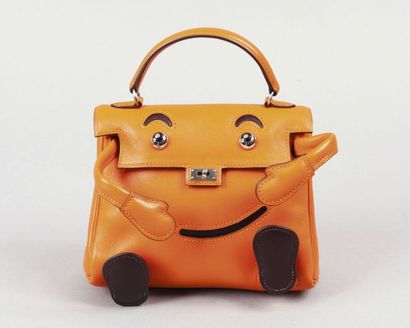 HERMES Paris made in France édition limitée Rare sac «Kelly Doll» en cuir orange...