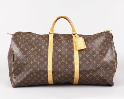 LOUIS VUITTON Sac «Keepall» 60cm en toile monogram et cuir naturel, fermeture éclair,...