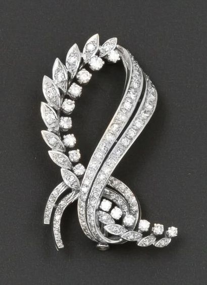 null Broche «Noeud» en or gris entièrement sertie de diamants taillés en brillant....