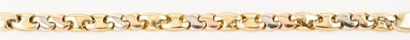 KORLOFF Bracelet souple en or de trois couleurs. Signé Korloff. P. 24,9g