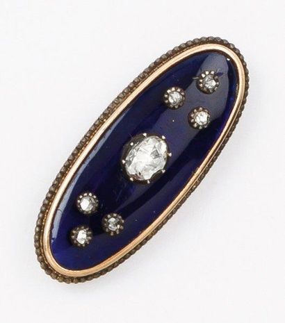 null Broche en or jaune 14k et argent émaillée bleu sertie d'un diamant ovale épaulé...