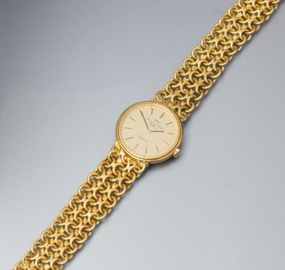 INTERNATIONAL WATCH & CO Bracelet montre en or jaune. Mouvement à quartz. Bracelet...
