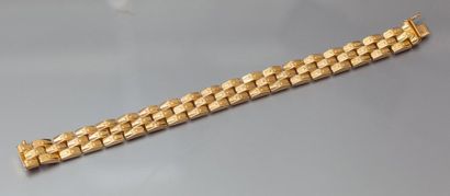 null Bracelet articulé en or jaune. P. 27,8g