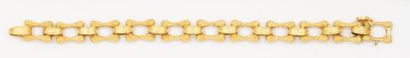 null Bracelet articulé en or jaune. P. 44,1g