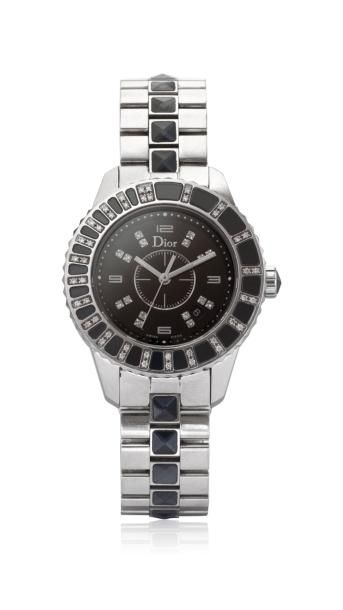 DIOR CHRISTAL Vers 2005 Montre bracelet de dame en acier. Boîtier rond, lunette tournante...