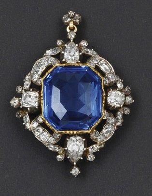 null Pendentif broche en or jaune et argent à décor de motifs floraux stylisés et...