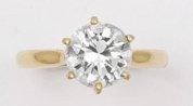 null Bague solitaire en or jaune orné d'un diamant taillé en brillant. Poids du diamant:...