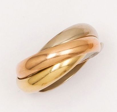 CARTIER - TRINITY Bague trois anneaux en or de trois couleurs. Signée Cartier. Tour...