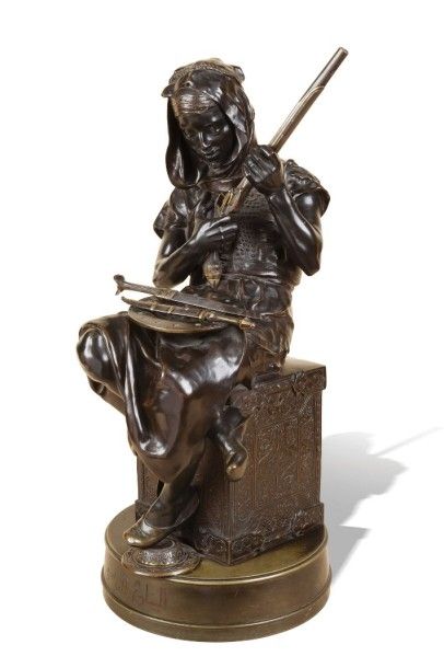 Emile PEYNOT (1850-1932) (d'Après) Jeune arabe vérifiant son arme Epreuve en bronze...