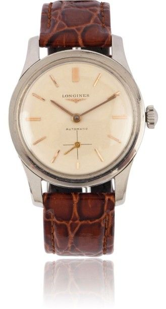 LONGINES VERS 1960 Belle montre bracelet en acier. Boitier rond. Cadran crème avec...