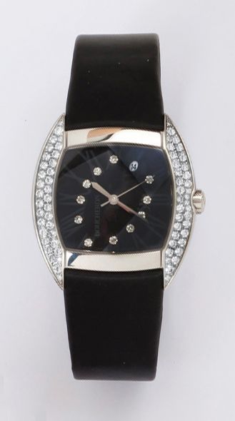 BOUCHERON «MEC» - Montre de poignet tonneau en acier, la lunette sertie de diamants,...