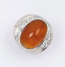 REPOSSI Bague jonc en or jaune godronné ornée d'un cabochon de citrine bordé de diamants...