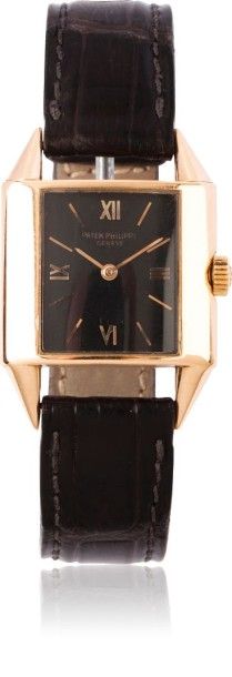 PATEK PHILIPPE N°618023 vers 1960 Montre bracelet en or rose 18k (750). Boitier rectangle...
