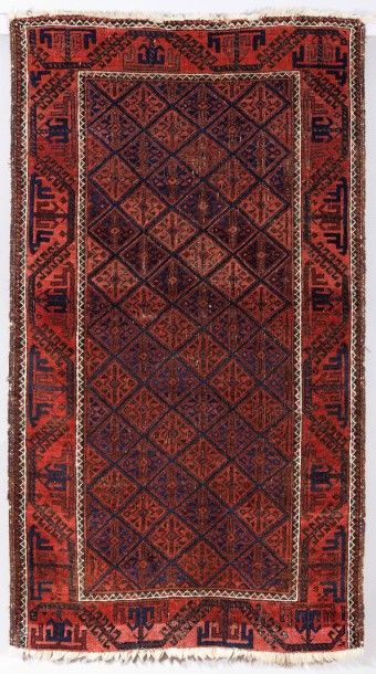 null Tapis Beloutch, Beloutchistan, Iran An antique Baluchi rug Décor composé d'un...