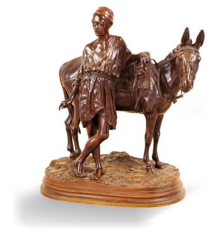 D'après Alfred DUBUCAND (1828-1894) L'Anier du Caire Épreuve en bronze à patine polychrome,...