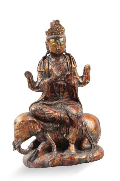 null Sujet en bronze laqué représentant une Guanyin en délassement royal sur son...