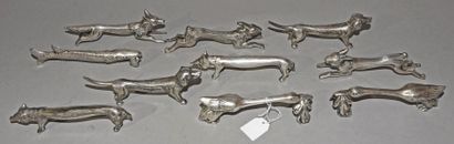 null Dix porte-couteaux en métal argenté en forme d'animaux représentés en ronde...