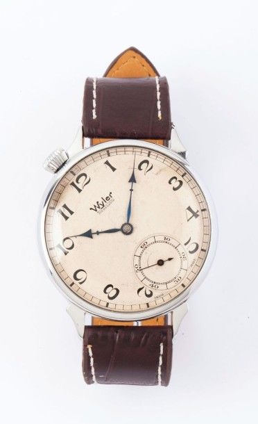 WYLER vers 1960 
Grande montre bracelet en metal chrome (remontage).
Cadran creme...