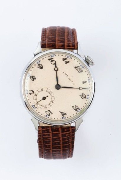 LUZ Geneve vers 1960 
Montre bracelet en métal chromé (remontage). Cadran crème,...