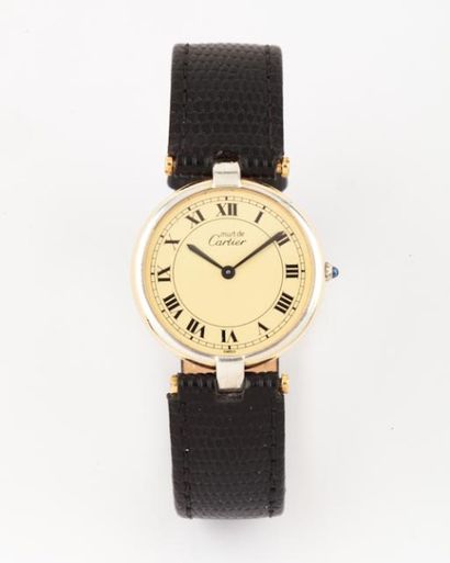 CARTIER " Must"- Bracelet montre en vermeil. Cadran crème, chiffres romains. Mouvement...