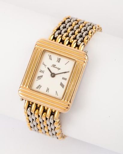 POIRAY "MA PREMIERE"- Bracelet montre de dame en or jaune et acier. Cadran blanc,...