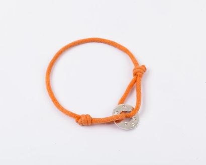 DINH VAN «Cible» - Bracelet de cordon de soie orange orné d’un cercle en or gris...