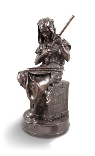 Emile PEYNOT (1850-1932) (d'Après) 
Jeune arabe vérifiant son arme
Épreuve en bronze...