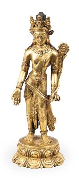 null Sujet en bronze doré représentant un Boddhisattva debout sur un socle lotiforme,...