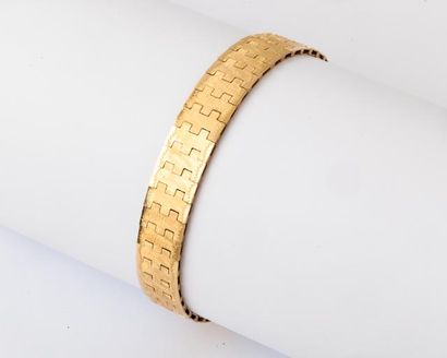 Bracelet articulé en or jaune. P. 25,1 g...