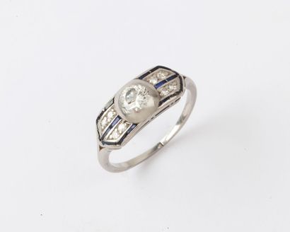 null Bague en platine ornée d’un diamant taillé en brillant calibrant 0,25 carat...