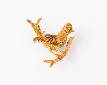 null Broche «Oiseau» en or jaune ciselé. Dimensions : 3x2,5 cm environ. P. 7,3 g...