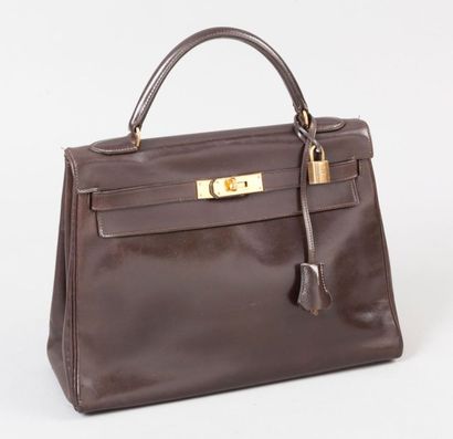 HERMES Paris made in France année 1983 Sac "Kelly" 32cm en cuir marron, attaches...