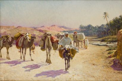 Alexis DELAHOGUE (1867-1953) Caravane au bord de l'oued Huile sur toile, signée en...