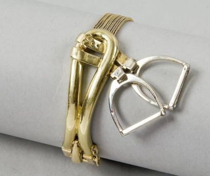 HERMES Paris *Bracelet ceinture en or jaune figurant des chainettes retenues par...