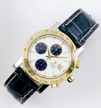 GIRARD PERREGAUX Montre de poignet chronographe en or jaune et acier. Cadran blanc...