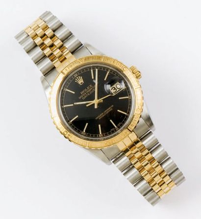 ROLEX «Turnograph» Bracelet-montre en or jaune et acier, cadran noir, date, lunette...