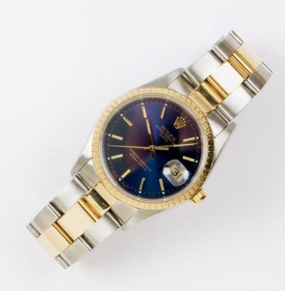 ROLEX «Oyster Perpetual Date» Bracelet-montre en or jaune et acier. Cadran bleu,...