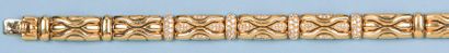 BOUCHERON Bracelet articulé en or jaune serti de diamants. Signé Boucheron N° 165...