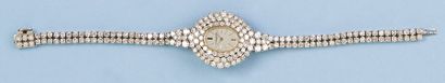 VACHERON CONSTANTIN Bracelet montre de dame en or gris entièrement serti de diamants....