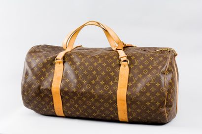 Louis VUITTON Sac "Polochon" en toile monogram, fermeture éclair, double poignée....