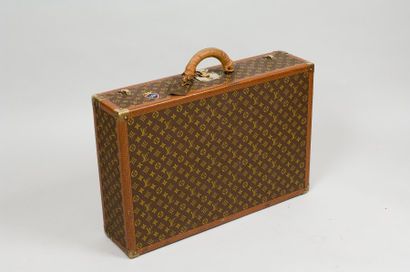 Louis VUITTON Valise Bisten en toile monogram, bordures, lozinées, coins, fermetures...