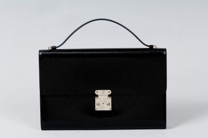 Louis VUITTON Pochette de forme cartable en cuir monogram mat mini noir, fermeture...