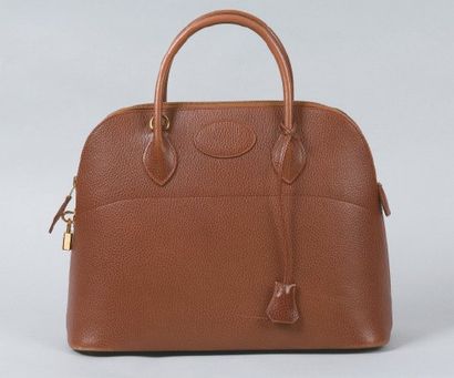 HERMÈS Paris made in France *Sac «Bolide» 36 cm en cuir grené marron, fermeture éclair,...