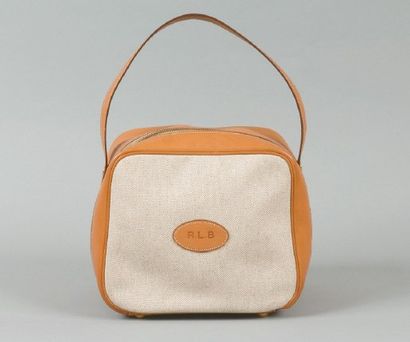 HERMÈS Paris made in France *Sac de forme carré en toile beige et cuir naturel chiffré...