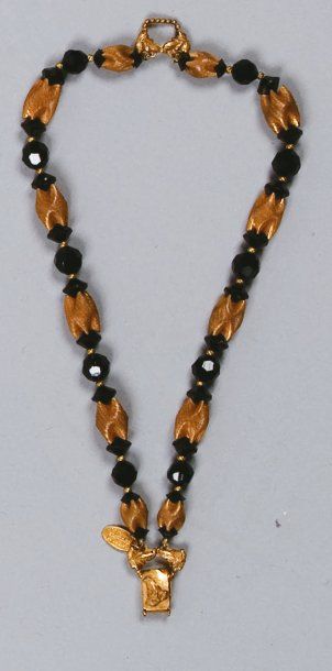 Miryam HASKELL Bracelet en perles fantaisies et métal.