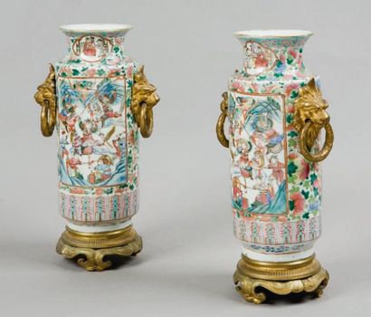 CHINE- CANTON Paire de vases montés en bronze doré à décor polychrome de mandarins....