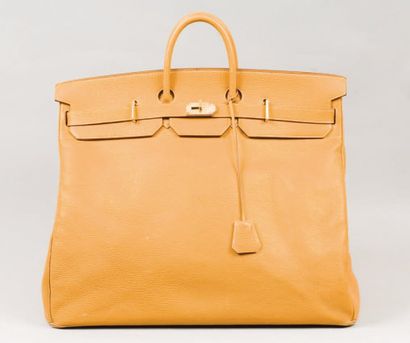 null HERMÈS Paris made in France *Sac « Haut à courroies « 55 cm en cuir grené gold,...