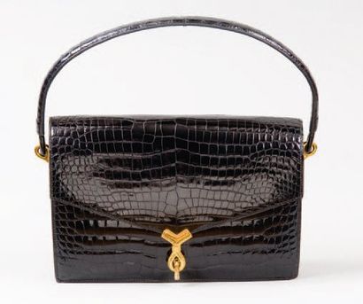 null HERMÈS Paris *Sac « Escale «à deux soufflets en crocodile noir, attaches et...